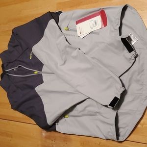 Sugoi running/ cycling windbreaker type jacket size medium.